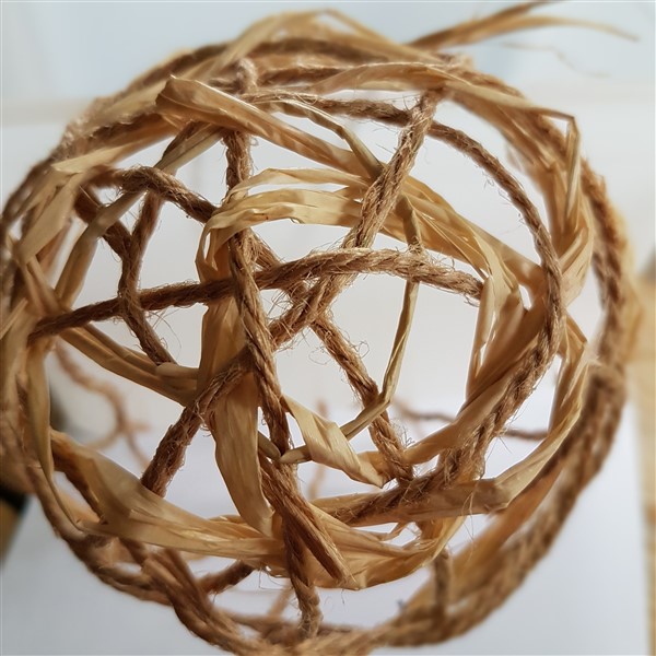 Leftfootdaisy-handmade-woven-birds-nest-starting-to-weave-the-raffia